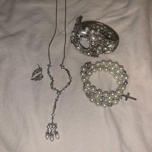 Jewelry set necklace, set of earrings and bracelet